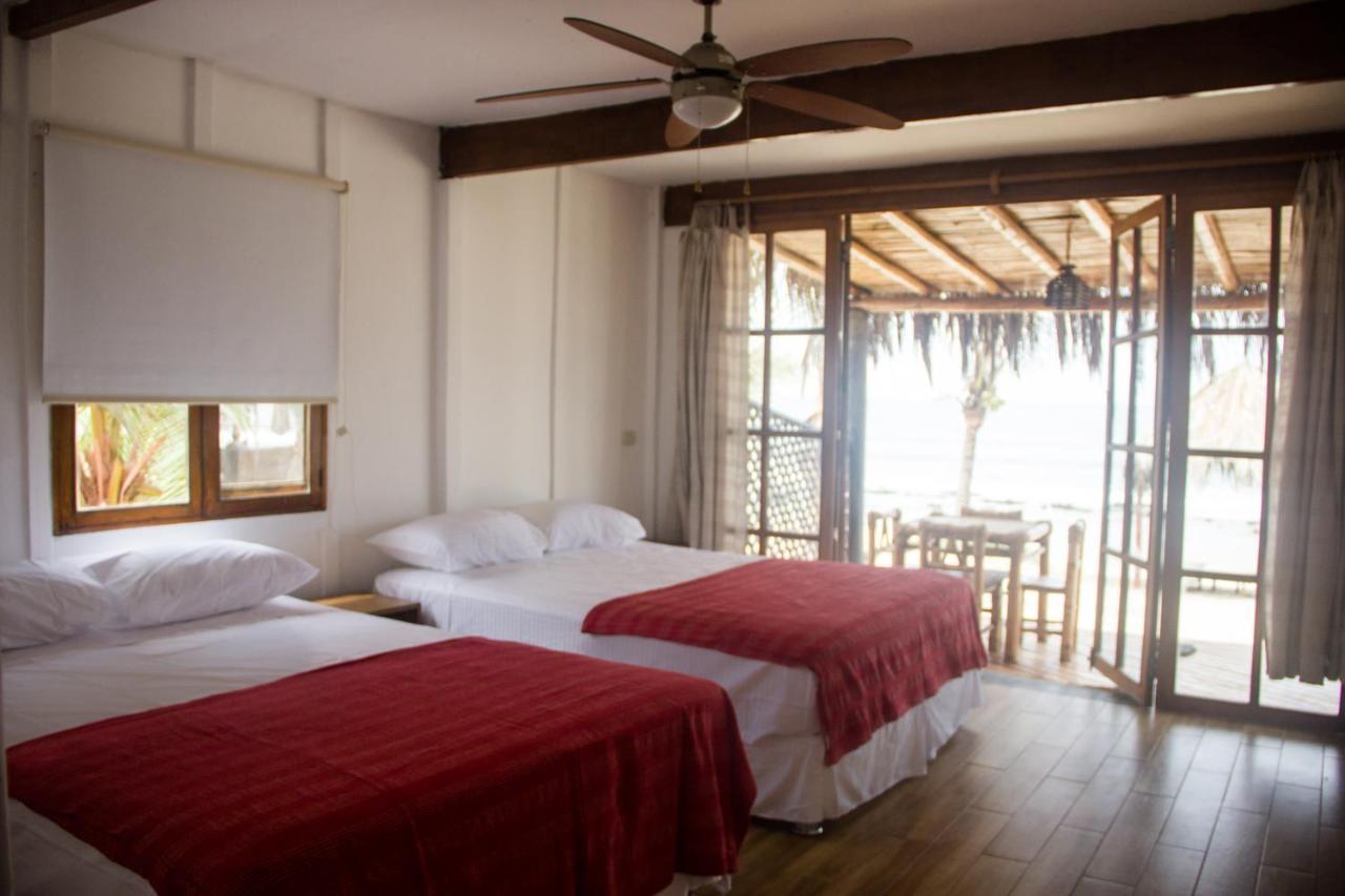 Hoja De Palma Bungalows Canoas de Punta Sal Exteriör bild